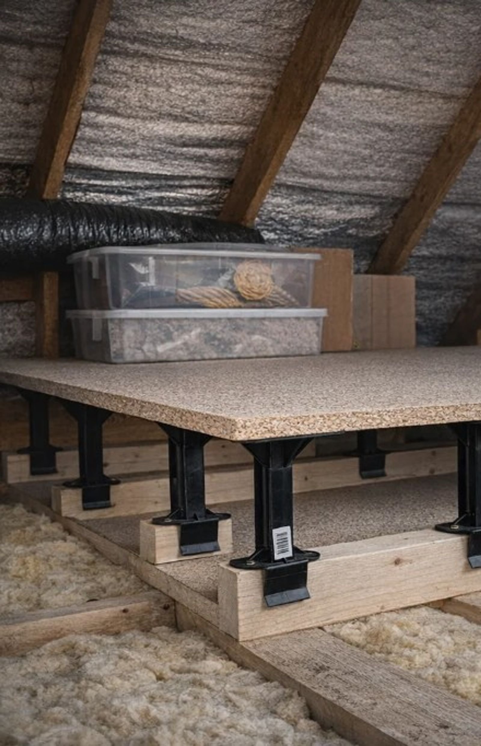 LoftStilt loft stilts supporting a raised loft floor above insulation in a UK loft